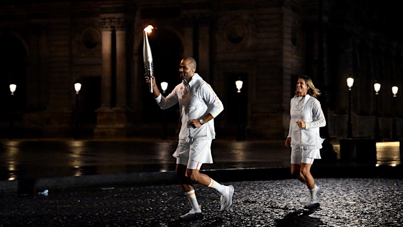 French Vintners Carry the 2024 Paris Olympic Torch