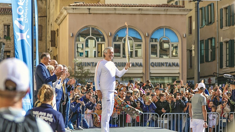 French Vintners Carry the 2024 Paris Olympic Torch